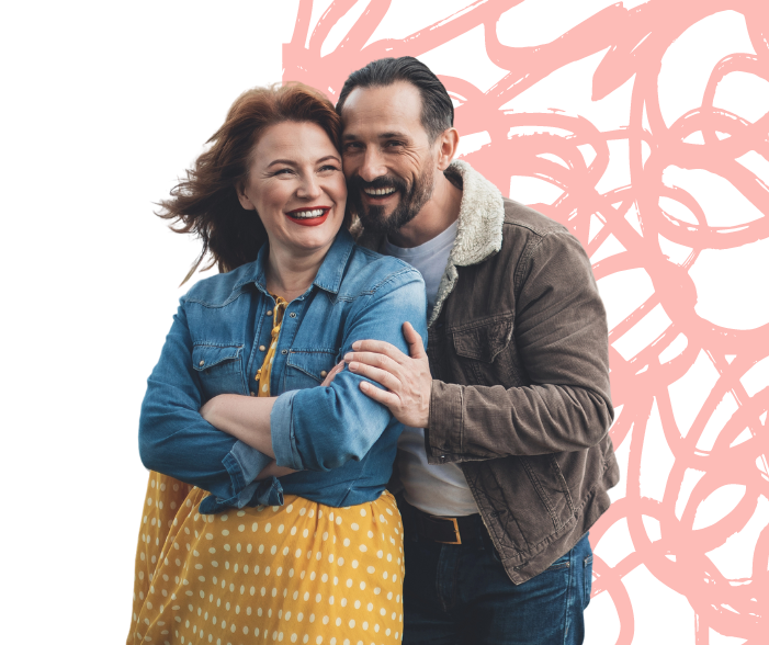 Parents hugging and smiling